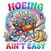 A vibrant retro glitter floral wheelbarrow with rain boots and the text hoeing aint easy png